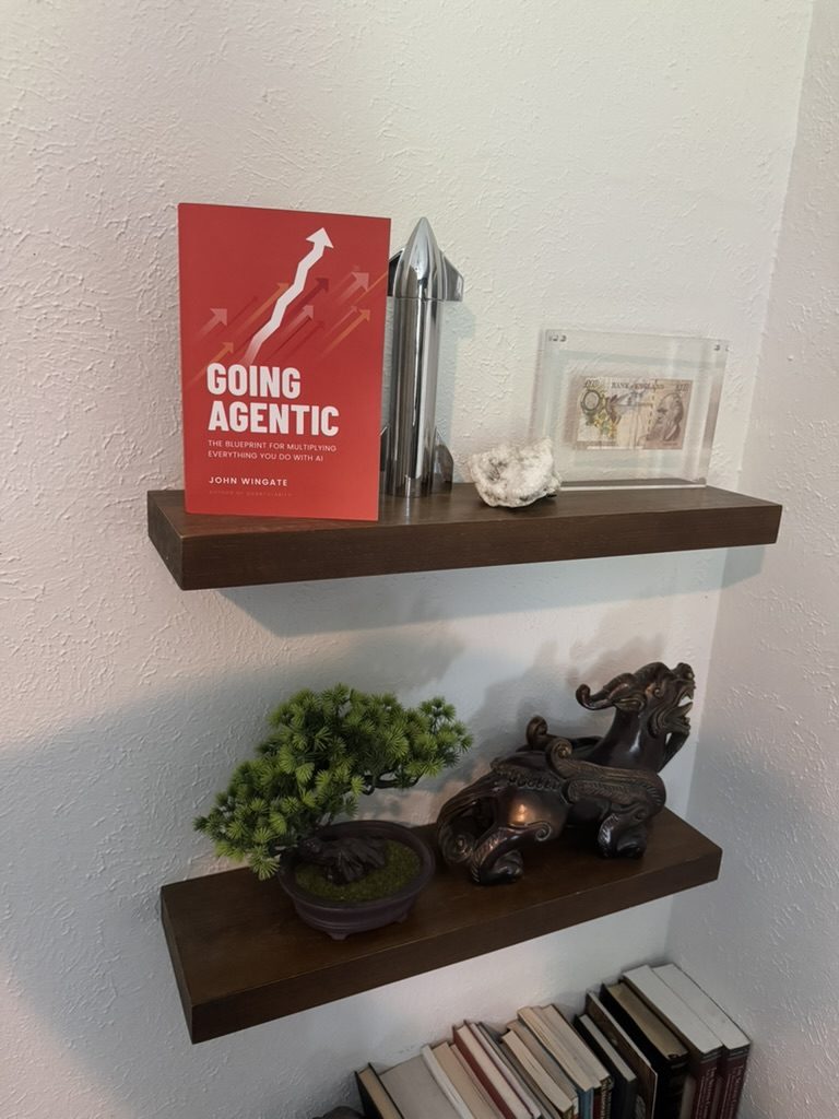 Going Agentic on a shelf beside a rocket model