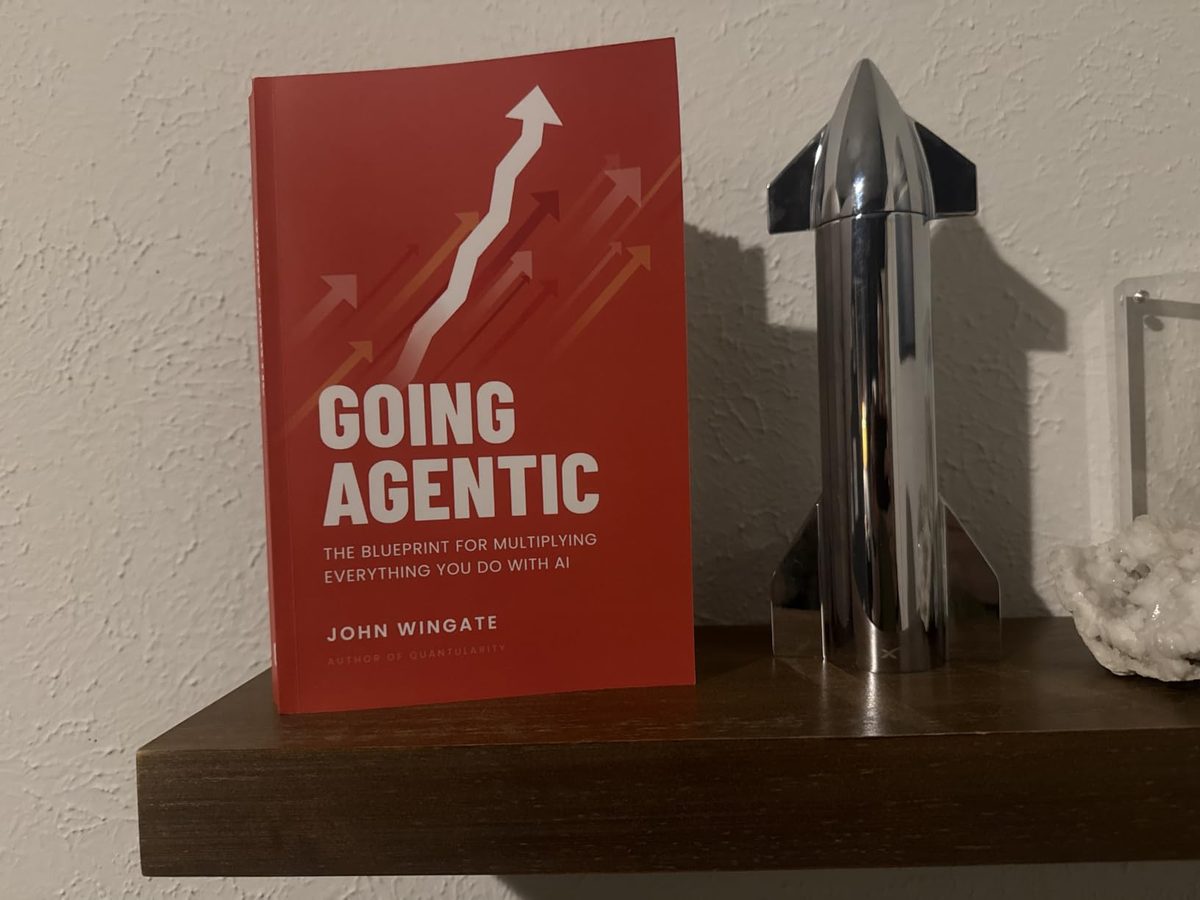 Going Agentic on a shelf beside a steel rocket model