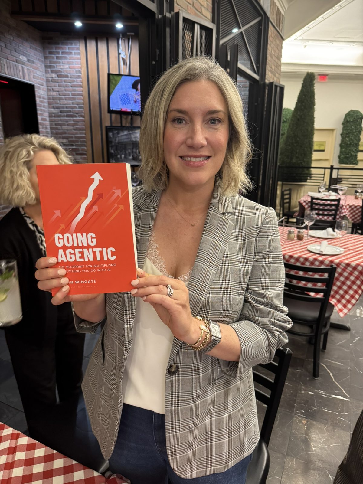 A reader with Going Agentic at a restaurant