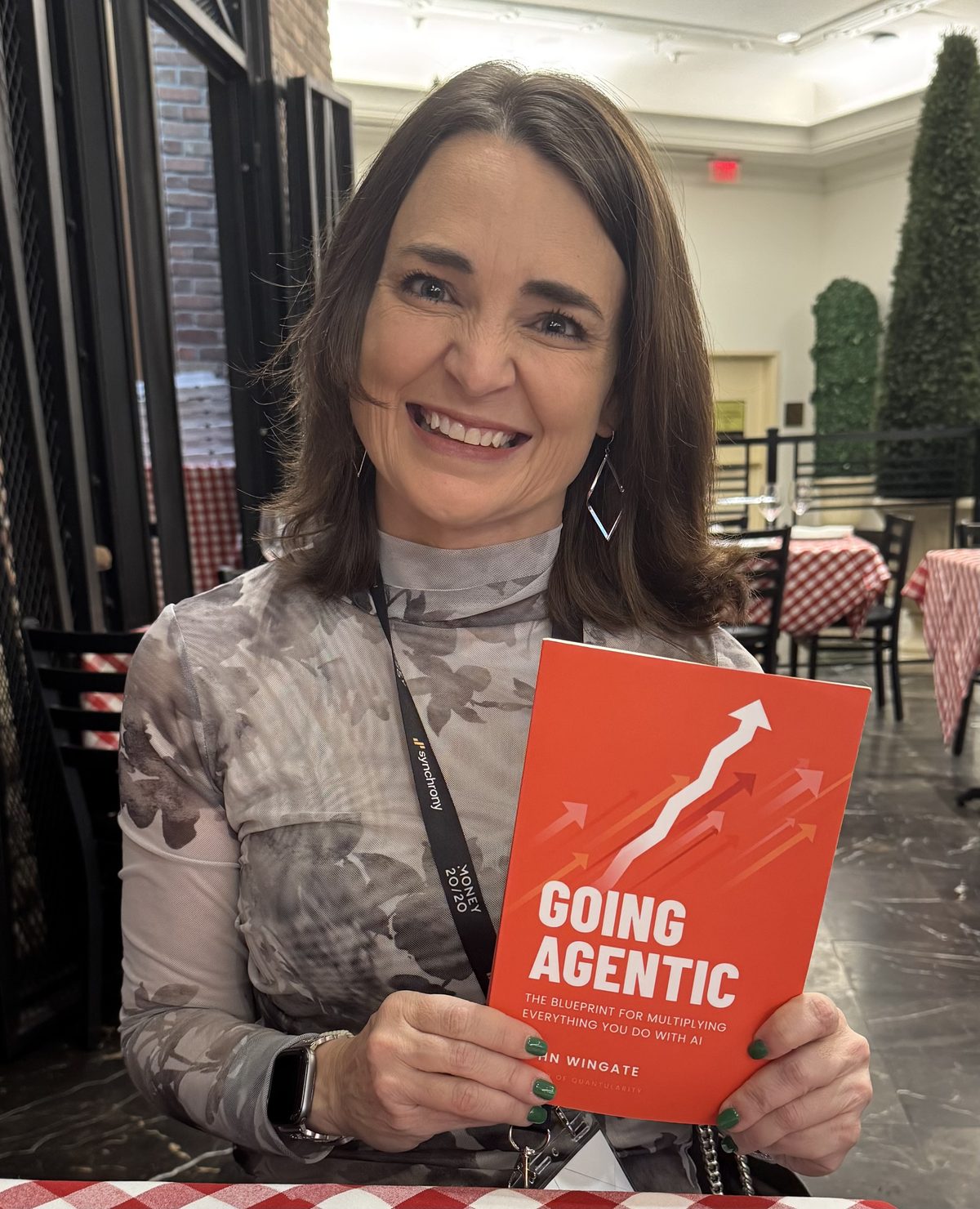 A reader with Going Agentic at a restaurant