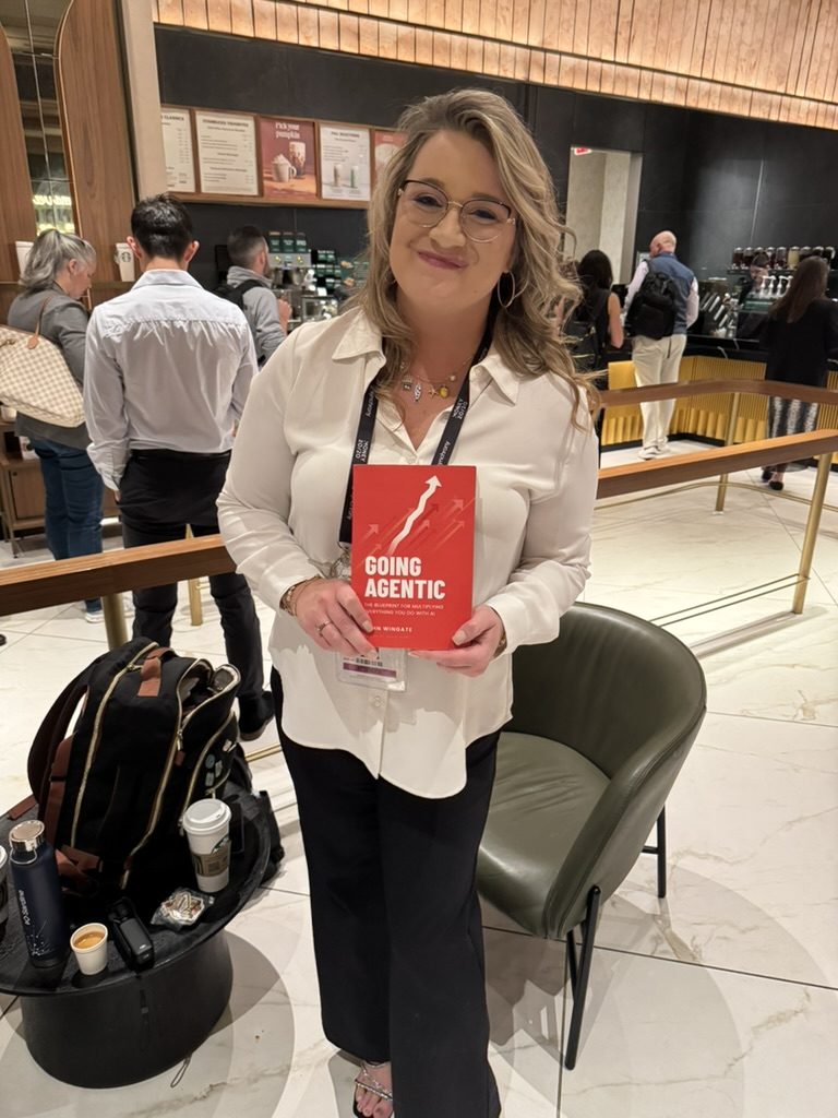 A reader with Going Agentic at a conference