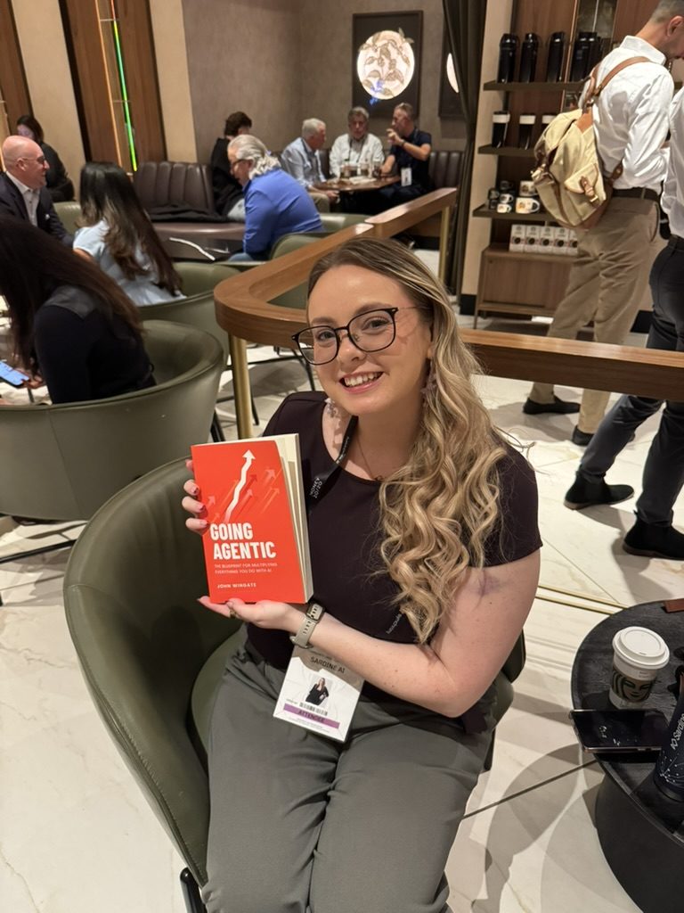 A reader with Going Agentic at a lounge