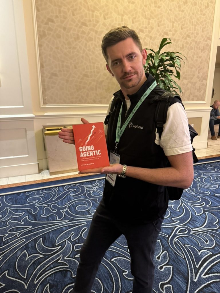 A reader with Going Agentic at a conference